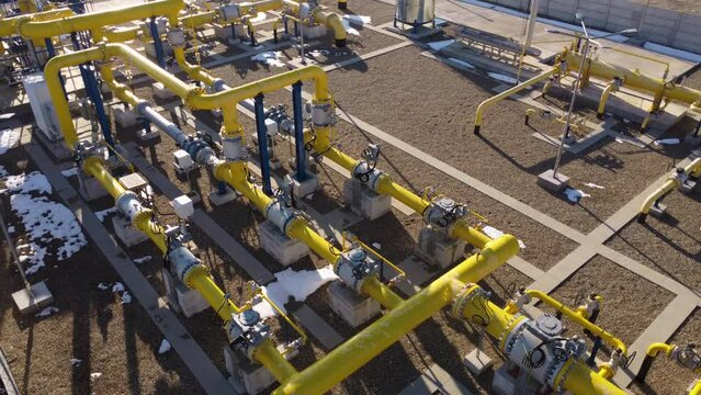 Yellow pipes through industrial complex carrying variety of fluids essential for production gas oil water. Pipelines form lifelines factory facilitating transfer raw materials resources yellow pipes.