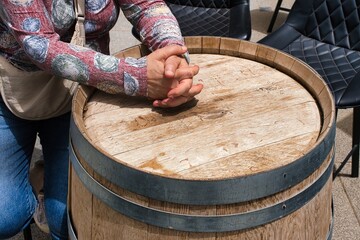 Hands on a beer barrel. Copy spacing.