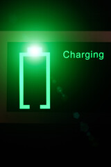 Vertical view of a Control panel display of lithium Portable Power Station. Charging laptop smartphones, power banks and other gadgets.