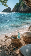 A clear blue sea, with a simple thin mat laid out on the beach, featuring sunglasses and hat arranged neatly, and a picnic basket nearby. Summer dreaming. Travel. 