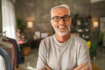Portrait of one mature senior caucasian man stand and smile at home