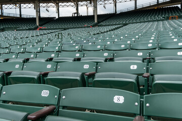 A stadium full of empty seats with numbers on them