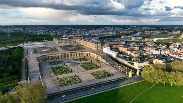 Aerial view of french castle, Palace of Versailles and landscaped gardens, near Paris. France.