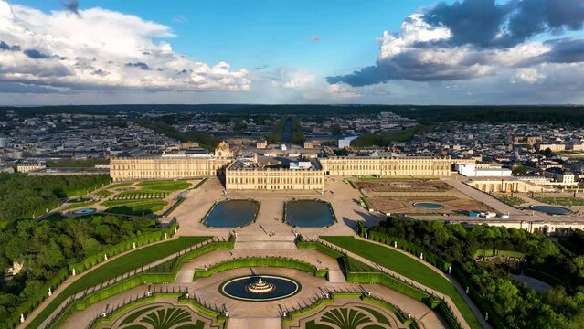 Aerial view of french castle, Palace of Versailles and landscaped gardens, near Paris. France.