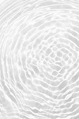 White rippled water surface. Desaturated transparent clear water shadow texture surface with ripples, splash, and bubbles. Spa concept background. Mockup for summer product. Top view, Vertical