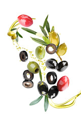 Flying olives and splash of oil on white background
