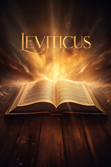 Book of Leviticus. Open glowing Bible set on wood. Rays of golden light emanating from the book. Ideal for bible studies, religious meetings, intros, and much more. Vertical with copy space.