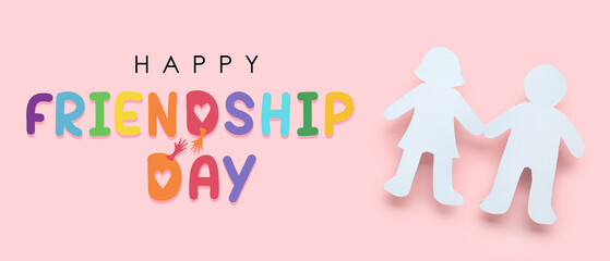 Male and female human figures holding hands on pink background. Friendship Day celebration