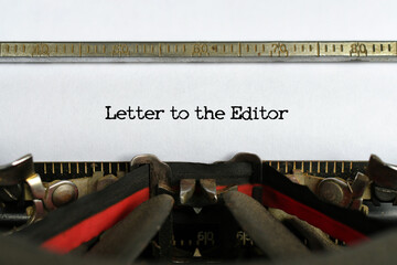 Letter to the Editor words typed on a sheet of paper in a vintage typewriter,  concept