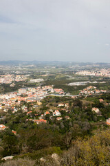Obraz premium View of Buildings on the Hillside from the Moorish Castle in Sintra Portugal