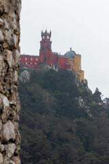 Obraz premium View of the Colorful Sintra Castle from the Moorish Castle in Sintra Portugal