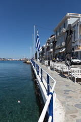 Obraz premium pier and store fronts on the water 