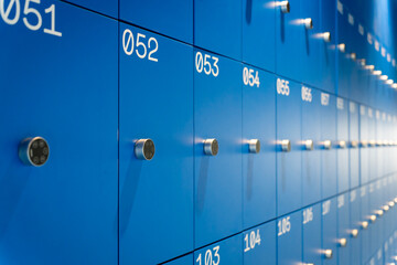 Row of blue lockers with number locks