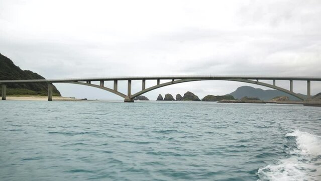 Kouri Big Bridge at sunset Okinawa Island, Japan. Dramatic weather. High quality 4k footage.