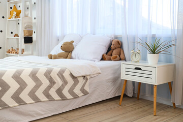 Interior of modern stylish children's room with toys