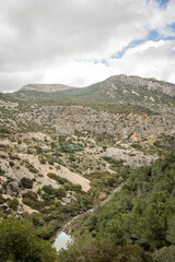 hiking trail caminito del rey, kings walkway, in Malaga Spain. narrow footpath leads through natural beauty mountain range cliff faces of gaitanes gorge. hisotric landmark popular tourist attraction