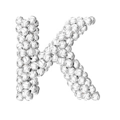 Symbol made of silver volleyballs. letter k