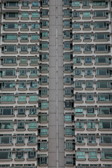 facade of urban apartment house in Hong Kong