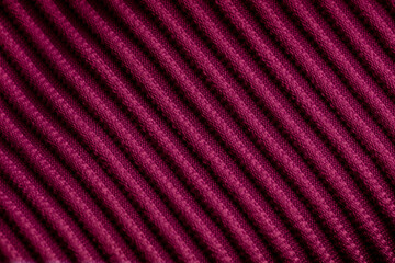 Closeup of pink corduroy cloth as patterned textured background