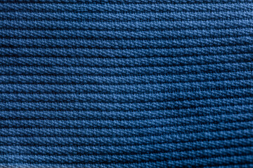 Closeup of blue corduroy cloth as patterned textured background