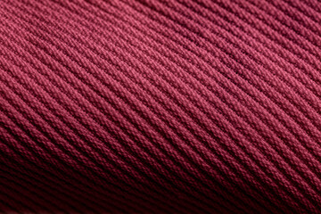 Closeup of pink orange corduroy cloth as patterned textured background