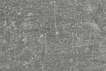 Grey concrete textured surface as background, closeup
