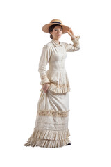 Young woman with hand on brim of strawhat wearing a beige vintage 1880s dress isolated on white