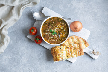 Traditional Turkish thin bar shaped dough soup, homemade noodle soup, bacaklı çorba