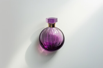 purple perfume bottle with pink cap on light background product photography concept