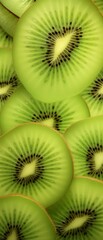 Green kiwi slices arranged in a circular pattern, with a gradient from light to dark.