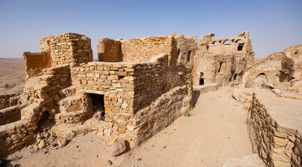 Ruins of ghorfas in ancient Ksar Beni Barka Berber settlement, Tataouine, Tunisia