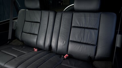 Obraz premium Black leather back seat