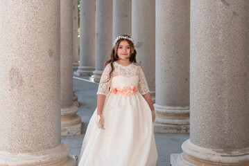 First Communion beautiful girl posing in white dress in a park 9.JPG