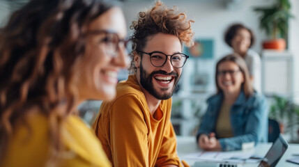 Obraz premium Group of People Laughing in an Office