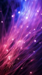 Naklejka premium Abstract close-up of purple and blue fibers, creating a unique blend of colors and textures in fiber optics light
