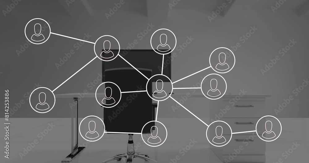 Poster image of network of connections with icons over office desk with computer