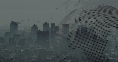 Image of black spots, spinning globe and data processing against aerial view of cityscape