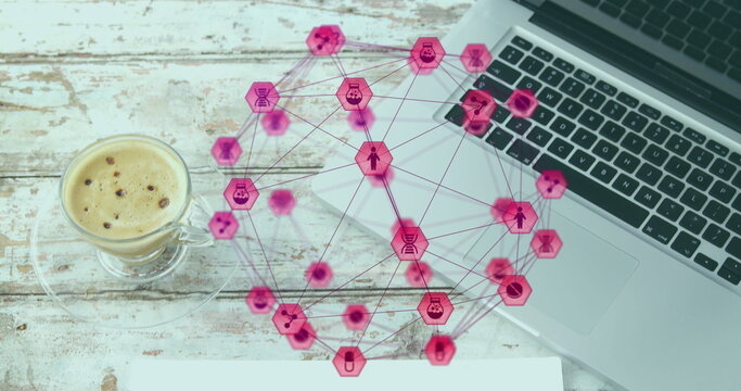 Image of connected icons globe over coffee cup, cellphone, pencil, paper and laptop on table