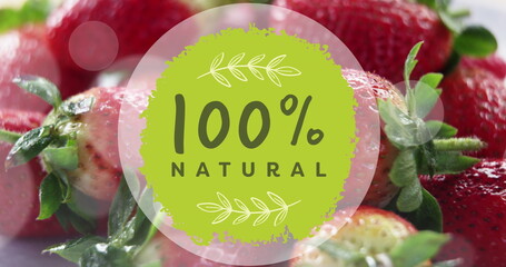 Image of 100 percent natural text over strawberries