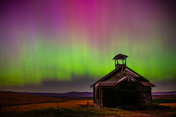 Northern Lights Over an Abandoned Schoolhouse 