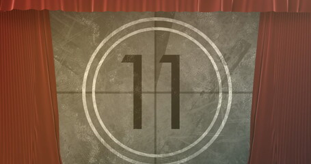 Image of red curtain over countdown