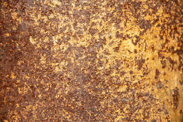 Gold texture design element blurred background glittering. Golden pattern backdrop decoration with copy space. Magic yellow orange shiny glowing selective focus. Glamour effect gold antique defocused