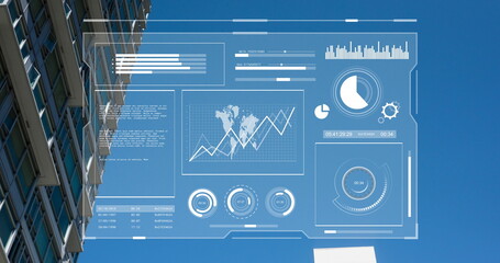Image of interface with data processing over tall buildings against blue sky