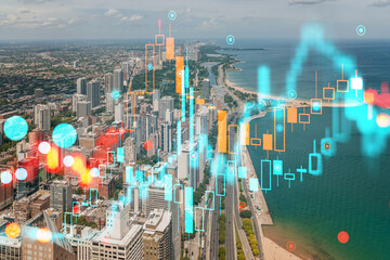 Aerial view of a city with a hologram overlay, showcasing futuristic technology elements on a cityscape background. Double exposure