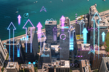 Aerial view of Chicago with a holographic overlay of technology and business graphics. Photo and...