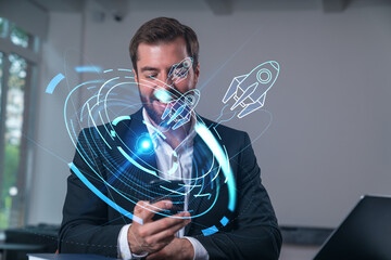 Smiling businessman talking holding using smartphone typing at office workplace with notebook....