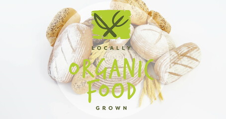 Image of locally grown organic food against close up of variety of fresh bread