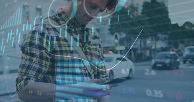 Image of graphs and trading board, caucasian man walking with bicycle and using smartphone