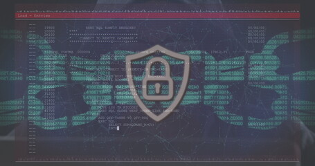 A young Caucasian professional analyzing digital data on screen