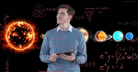 Image of businessman using tablet over equations and solar system